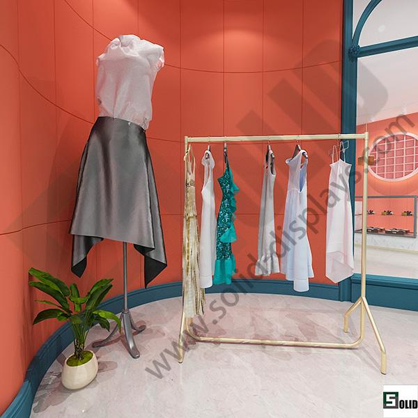 gold clothing display rack
